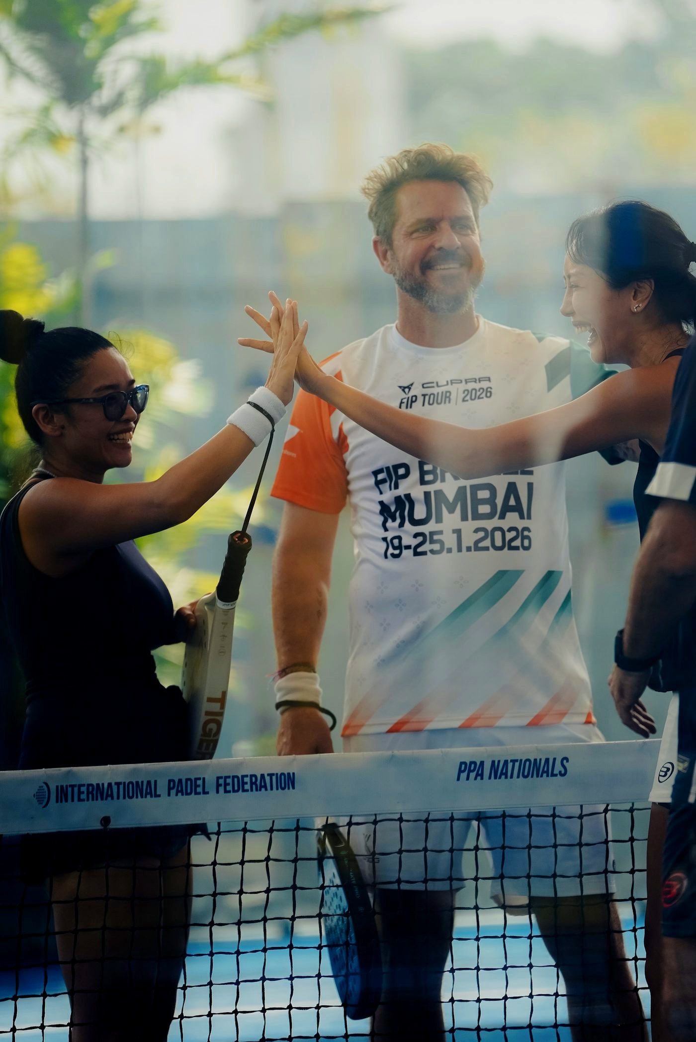Players celebrating at The Padel Club